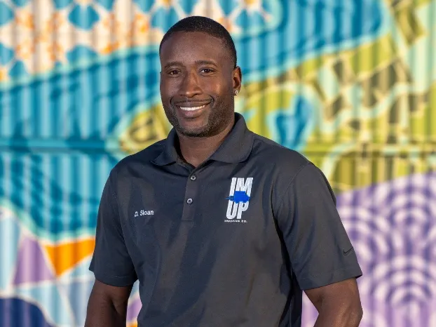 Professional contact portrait of Donald "Sloan" Sloan, CEO and Owner-Operator of IM UP Trucking.