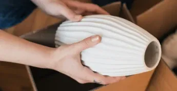 Delicate ceramic vase packaged securely for high-value white-glove transport