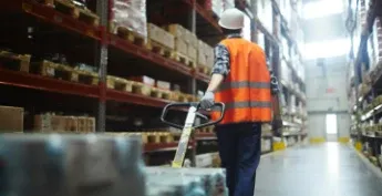 Pallets of inventory inside a modern distribution warehouse representing logistics hub operations